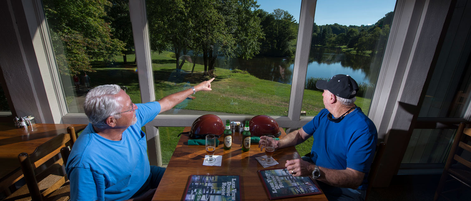 Men Enjoying Dining Room View at Peaks of Otter Lodge